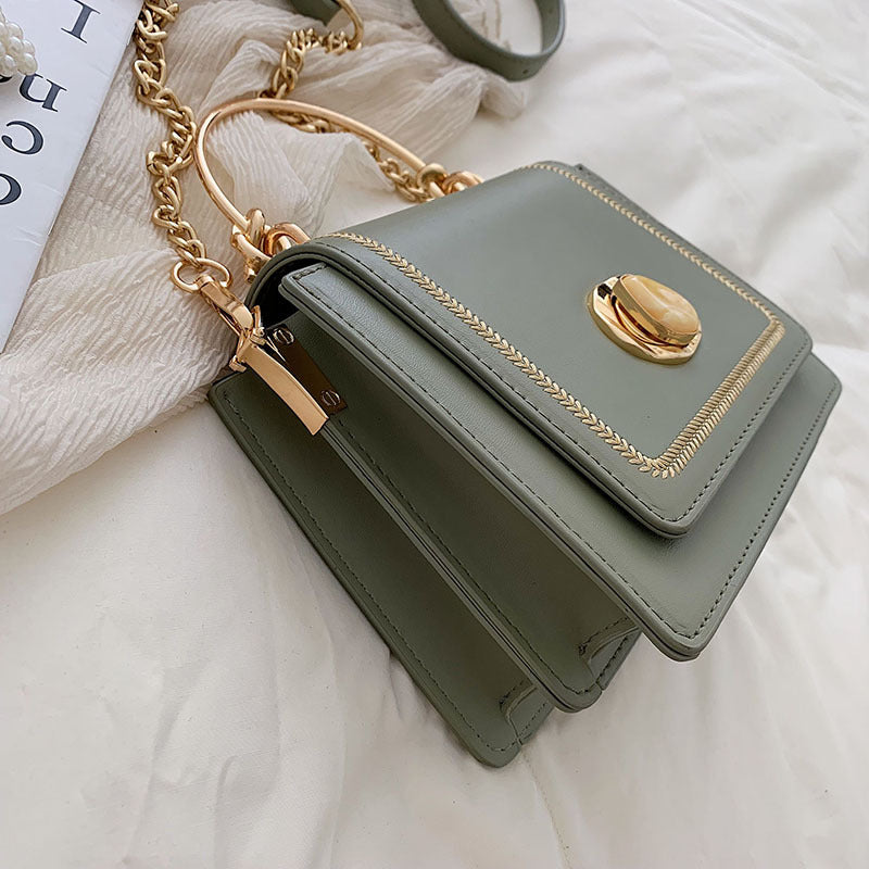Sleek Metal-Lock Designer Shoulder Bag