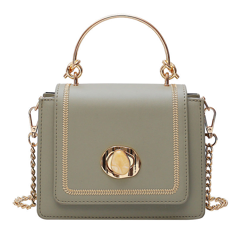 Sleek Metal-Lock Designer Shoulder Bag