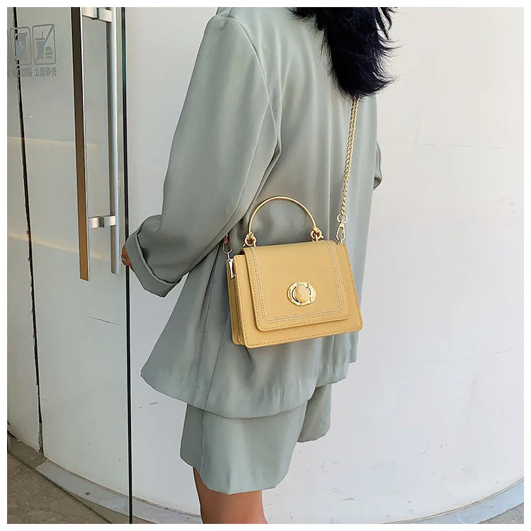 Sleek Metal-Lock Designer Shoulder Bag