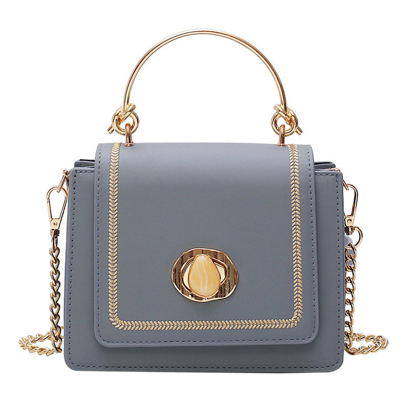 Sleek Metal-Lock Designer Shoulder Bag