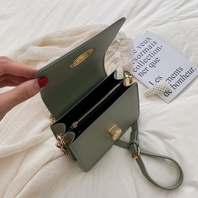 Sleek Metal-Lock Designer Shoulder Bag