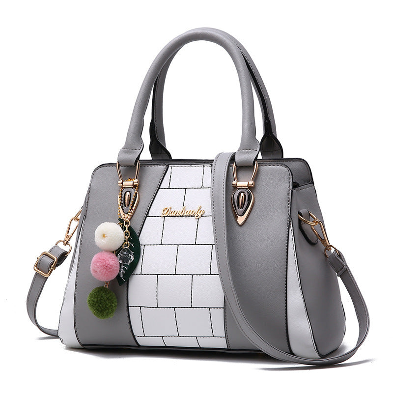 Europe and America Contrasting color handbags