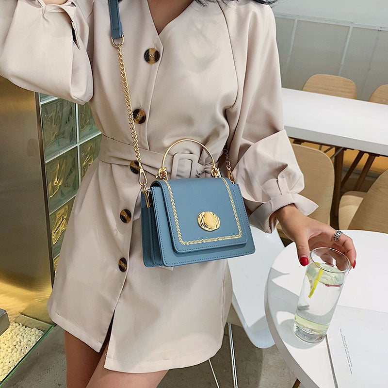 Sleek Metal-Lock Designer Shoulder Bag