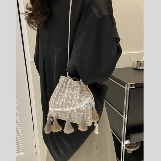 Tassel Trim Woven Bucket Crossbody Bag